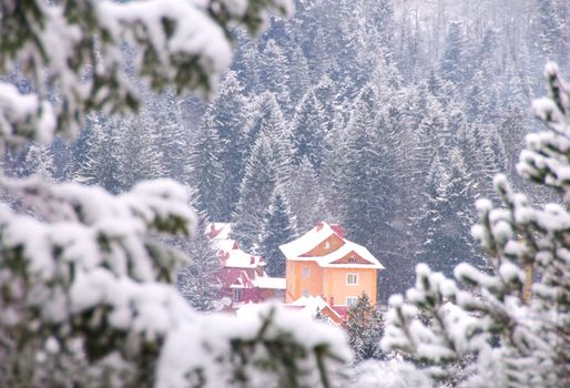 Idyllic photo of a mountain house during the winter. Taken on mountains Carpatu, Ukraine