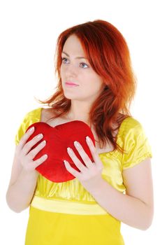 Young beautiul woman with red heart in her hands on white background. Focus on woman's eyes.