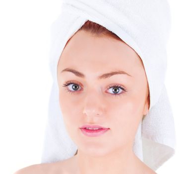 Woman with smooth skin and white towel on her hear. On white background.