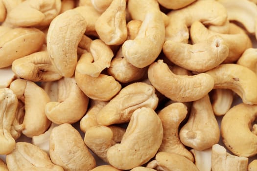 Ripe Cashew Nuts closeup on white background