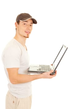 Handsome casual standing man with laptop on white background
