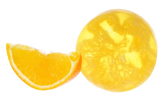 Juicy orange slices with scrubbing soap on white background