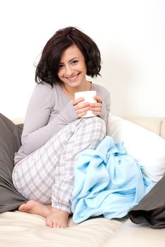 young beautiful girl with a cup of coffee