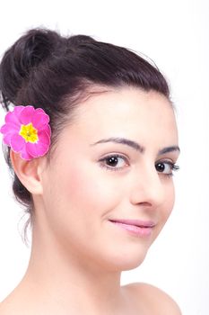 young beautiful brunette woman with flower