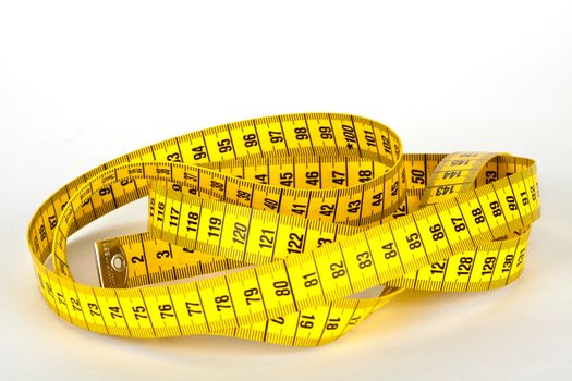yellow measure tape with scale in centimeters