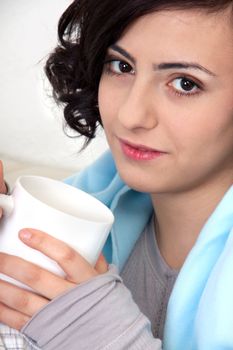 young beautiful girl with a cup of coffee