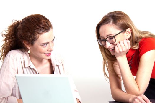 two business woman are discussing about a problem at work