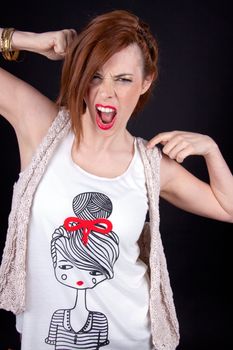 portrait of a beautiful young woman with red hair and red lips