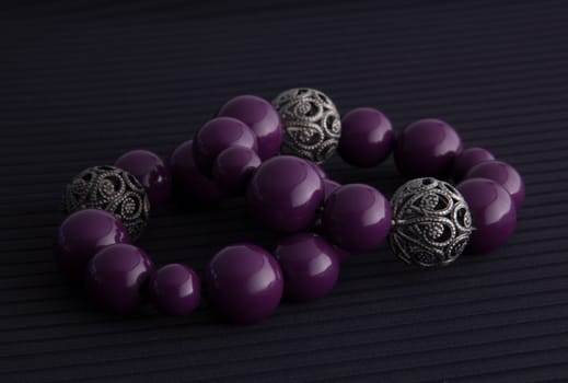 purple and silver bracelets