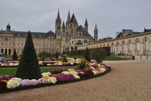 The Abbaye aux Hommes (Men's Abbey) is a former abbey church in the French  city of Caen, Normandy. Dedicated to Saint Stephen (Saint Etienne), it is considered, along with the neighbouring Abbaye aux Dames, to be one of the most notable Romanesque buildings in Normandy.