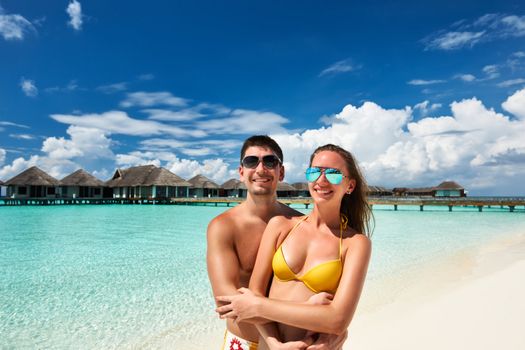 Couple on a tropical beach at Maldives