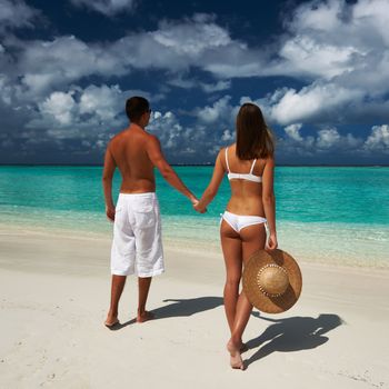 Couple on a tropical beach at Maldives