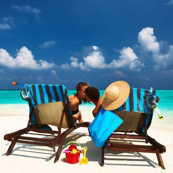 Couple on a tropical beach at Maldives