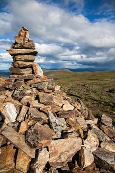 Rock cairn overlooking high alpine tundra