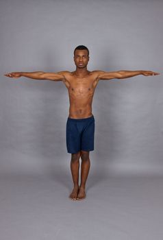 young man with black skin ist doing fittness