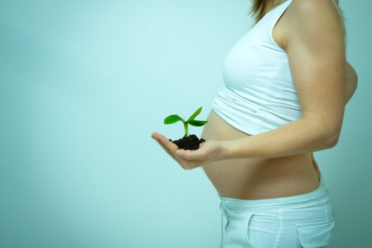 older pregnant woman looks forward to her baby