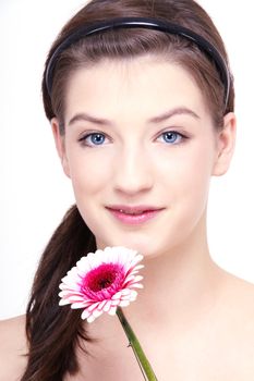 young beautiful brunette woman with flower