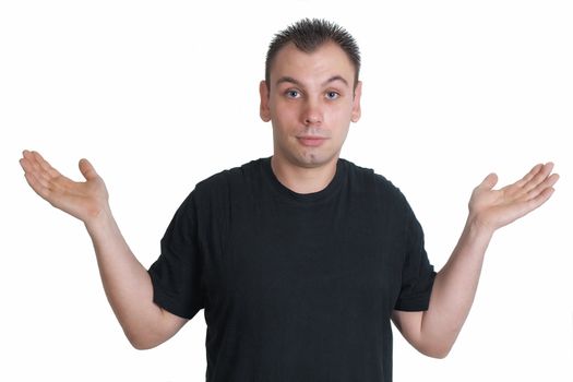 Confused caucasian man is unsure in black t-shirt, isolated on white 