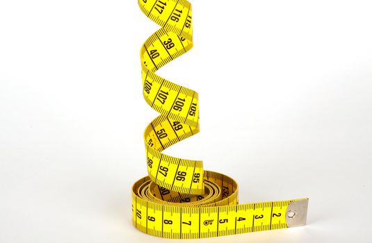 yellow measure tape with scale in centimeters