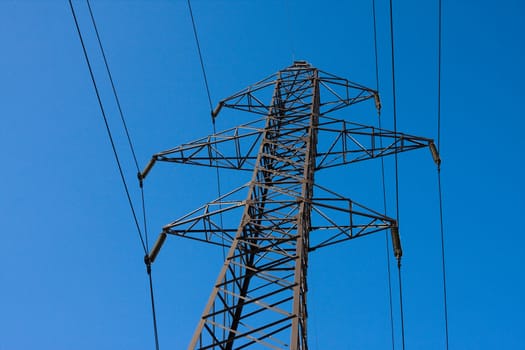 Transmission line on a background the blue sky