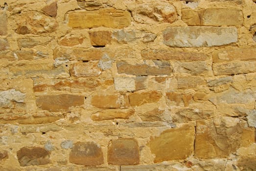 Old country house stone wall as background
