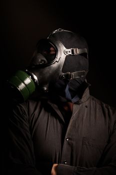 Handsome man in gasmask