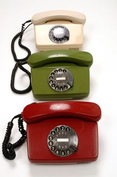 colourful retro phones symbolizing conference/teamwork/network............