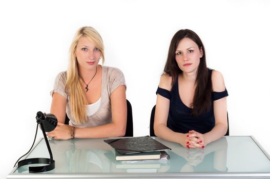 Two beautiful student girls getting ready for school isolated