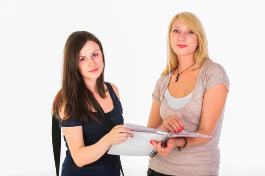 Two beautiful student girls getting ready for school isolated