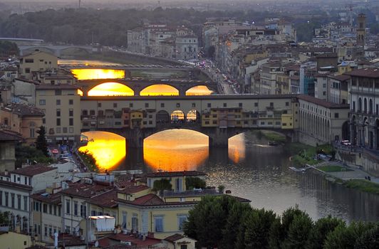 Ponte Vecchio in Florence, Italy at sunset