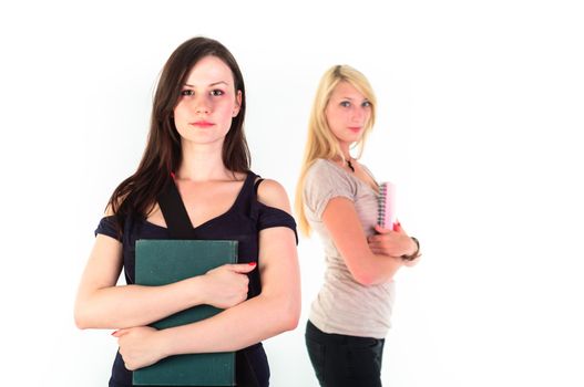 Two beautiful student girls getting ready for school isolated