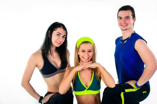 group of proud fitness instructors on white background