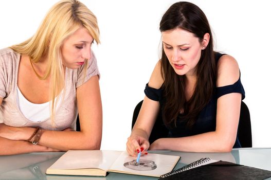 Two beautiful student girls getting ready for school isolated