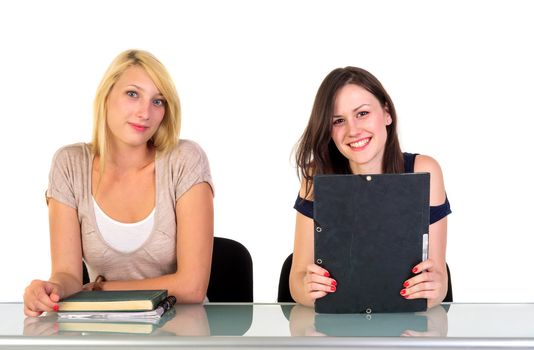 Two beautiful student girls getting ready for school isolated