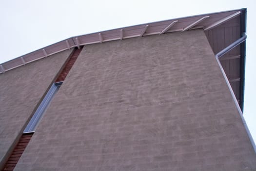Roof of a tile building. Covered with concrete