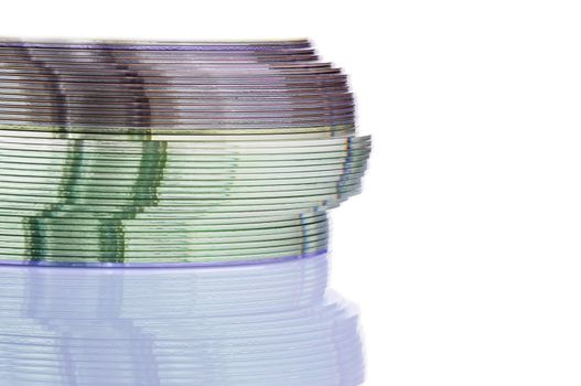 Close up view of a CD/DVD stack on a mirror