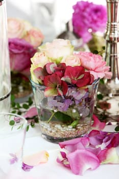 Glass full of flowers - table decoration