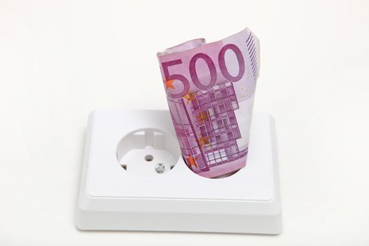 Socket and 500 euros on white background - bill concept