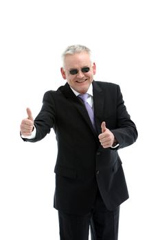 Smiling mature businessman with sunglasses on white background