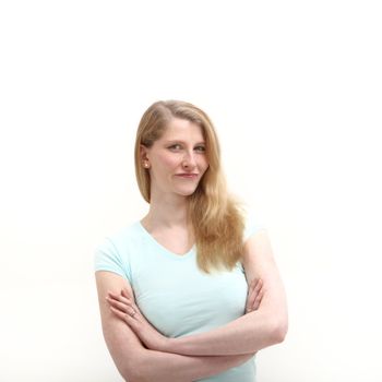Studio shot of confident blonde woman on white background