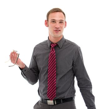 Smiling man holding glasses on white background