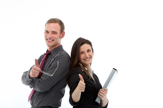 Enthusiastic attractive young business colleagues giving thumbs up for approval and success, man and woman back to back isolated on white