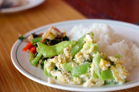 stir-fried vegetables on steamed rice , Thai style cuisine