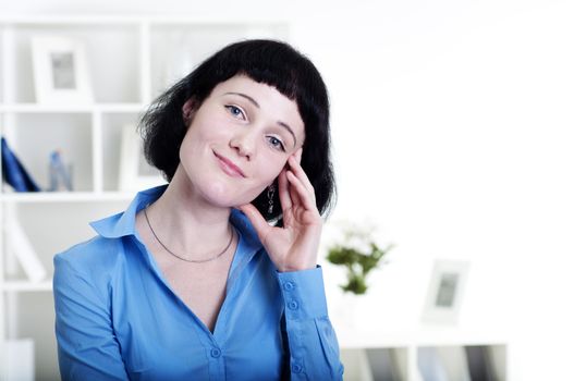 Portrait of a business woman in the office, dreams