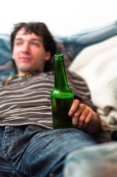 Young man with beer in his hands