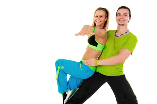 Young Fitness Instructors against white background in studio