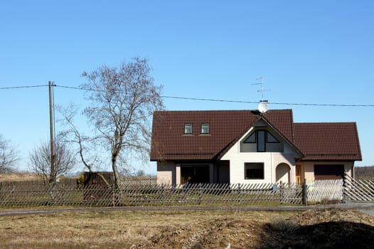 Modern apartment house on a background of the blue sky