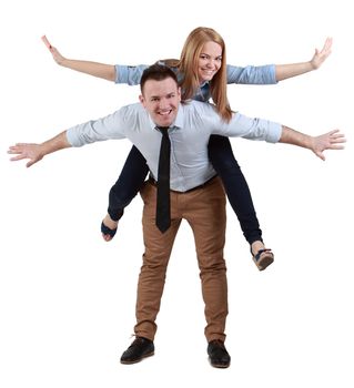 Image of a young couple having fun together against a white background.