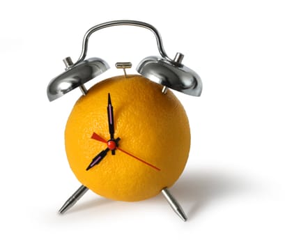 Fresh orange fruit alarm clock on white background