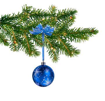 Blue glass ball hanging on green Christmas tree branch